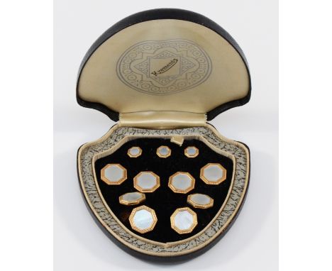 Krementz, an American set of Art Deco gold plated and mother of pearl dress suite, comprising cufflinks, four studs and three