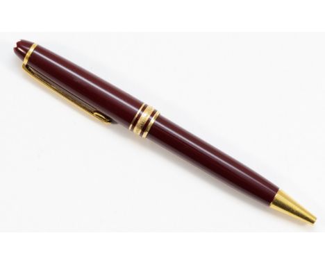 Mont Blanc, Meisterstuck, a maroon and gilt rollerball pen.