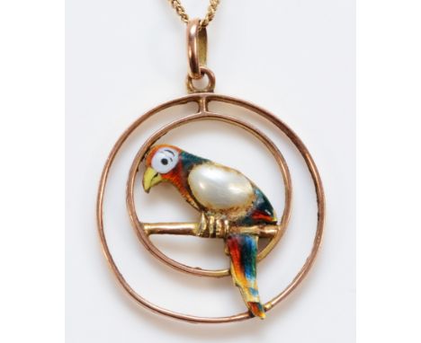 An Edwardian 9ct rose gold, enamel and pearl parrot pendant, diameter 21mm, later chain, 4gm