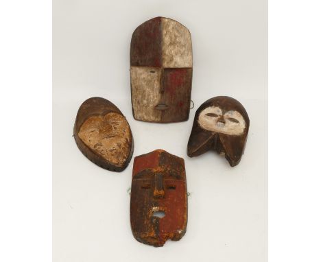 Ethnographica &amp; Tribal Art: four African tribal Gabon, Adouma Duma masks, carved wood with incised decoration having whit