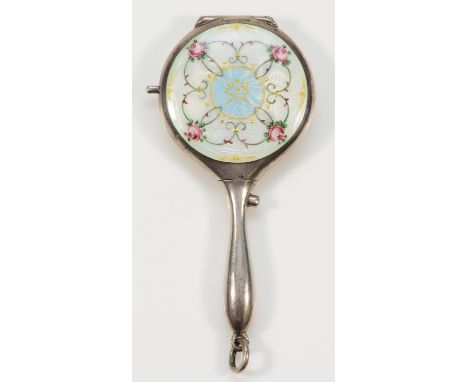 A German .935 standard silver and guilloche enamel novelty compact, in the form of a hand mirror, opening to a mirror and com