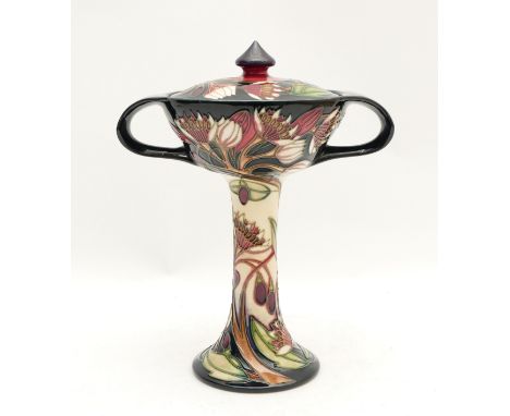 A Moorcroft lidded bonbonniere, in the pattern, 'Symphony', designed by Emma Bossons, dated 2003, H-23cm. Condition: First Qu