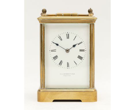 J.A. Aubert Fils, Lausanne, a 19th century brass striking carriage clock, the white enamel dial signed, the movement striking