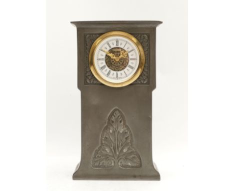 Liberty &amp; Co., a Tudric pewter mantel time piece, the case cast with stylized leaf design, replacement movement, the case