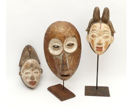 Ethnographica &amp; Tribal Art: Two West African, South Gabon, carved wood Punu masks, highlighted with Kaolin white and red 