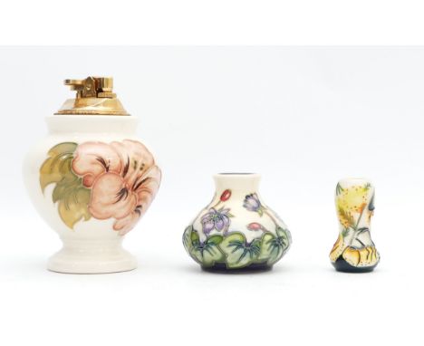 Three Moorcroft pieces, to include, a miniature vase, in the pattern 'Hepatica', dated 1999, H-6cm, a second miniature vase d