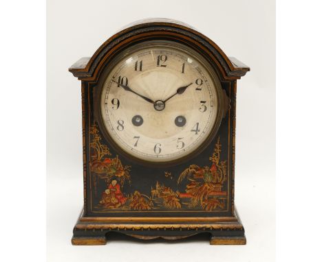 A French Chinoiserie mantel clock, black field with raised figures and buildings, 20.5 x 16cm.Not working when catalogued
