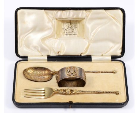 A George IV Coronation silver gilt christening set, by Saunders &amp; Shephard, London 1910, comprising an anointing spoon an