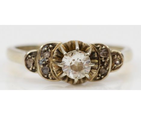 An Art Deco French white gold single stone diamond ring, owl mark, claw set with an old cut brilliant stone, approximately 0.