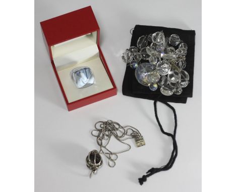 A Baccarat glass and silver ring, with original paperwork and box, together with a glass beaded necklace and a silver chain a