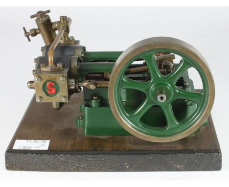 A Stuart Models 'Score' Horizontal Twin Cylinder engine on wooden plinth 