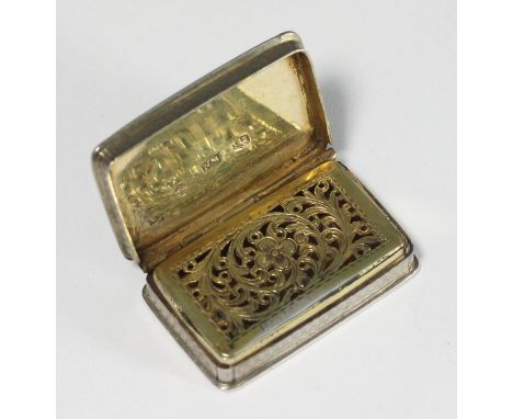 A William IV silver vinaigrette by Nathaniel Mills, of rectangular form, with engine turned decoration to each side, the hing