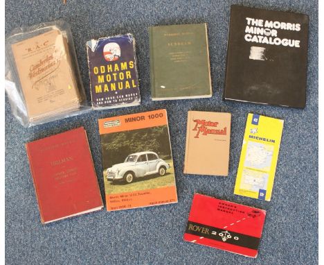 A small collection of assorted motoring books and manuals including the Morris Minor catalogue, a Rover 2000 owners manual, a