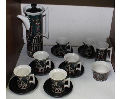 SECTION 20.  A Portmeirion pottery 'Magic City' coffee set comprising six cups and saucers, coffee pot, milk and sugar 