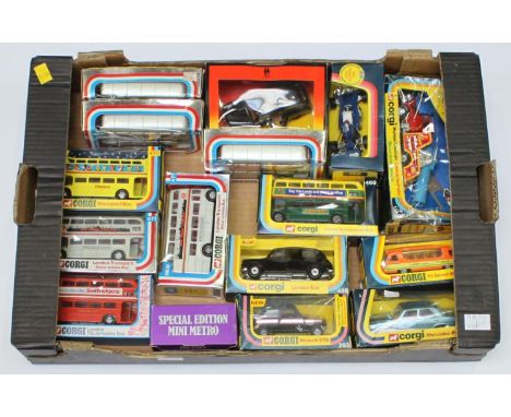 A collection of 16 assorted boxed Corgi vehicles comprising various buses including 'Routemaster Bus' and 'Disneyland Bus', t
