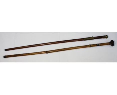 A bamboo sword stick / walking stick with metal mounts and flattened circular knop, overall length 97cm, together with a walk