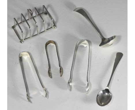 A collection of assorted silver items including a small toast rack by G Unite &amp; Sons &amp; Lyde Ltd, three pairs of sugar