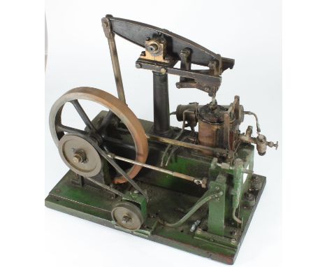 A Stuart live steam single cylinder beam engine, in green livery on a wooden base 33cm wide x 28cm high 