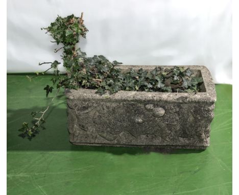 A small reconstituted stone trough planter 54cm X 25cm
