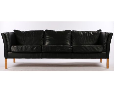 Black leatherette upholstered three seat settee, on square light wood legs