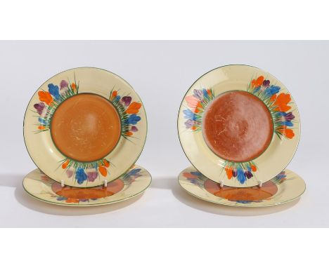 Four Clarice Cliff Bizarre Crocus Newport Pottery saucer dishes, printed marks to base and impressed number 32, 17.5cm diamet