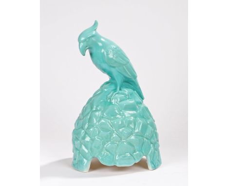 Royal Doulton Artandia Ltd speaker cover modelled as a parrot perched on a rock, 40cm high