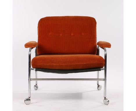 Mid 20th Century armchair, with burnt orange corduroy button back and seat, upholstered arm rest, tubular chrome frame and ca