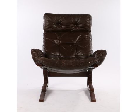 1970's brown leather 'Siesta' upholstered armchair in the style of Ingmar Relling for Westnofa, with button back and seat, on