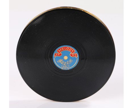 Very rare 1950s novelty compact shaped as a vinyl record (9cm diameter), with a blue record label in the centre marked Melody