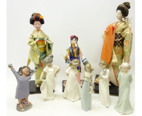 Lladro figure, three Nao figures of children, two other figures and three graduated Japanese figures of Geisha on stands (9) 