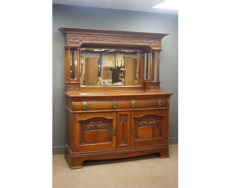 Edwardian walnut sideboard raised bevel edged mirror back, projecting cornice, carved foliate frieze, turned column supports 