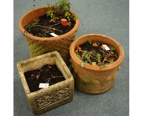 Two circular terracotta planters with floral mouldings, (D51cm, H39cm, largest planter), and single square composite stone pl