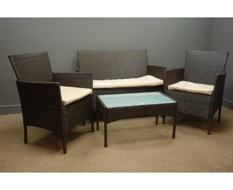 Rattan garden lounge suite; two seat sofa, pair matching armchairs and rectangular coffee table  Condition Report Click here 