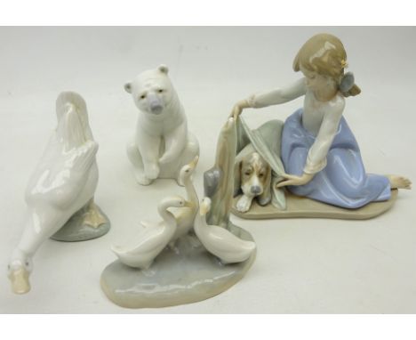 Lladro figure 'Dogs Best Friend' no. 5688, Lladro Polar Bear and Nao Goose and another Nao group (4) Condition Report Click h