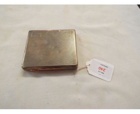 A mid 20thC silver engine engraved cigarette case with rose gold mounts dated London 1947 by David Sutton & Sons weighing app