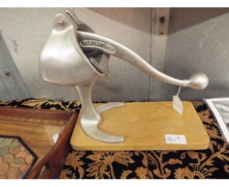 A mid-20thC 'Instant No.1' lemon and orange squeezer