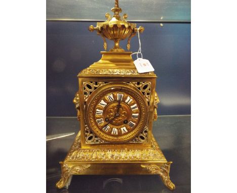 A mid-19thC J. Marti of France gilt brass ornate mantel clock having enamelled Roman numeral dial with eight day movement, st