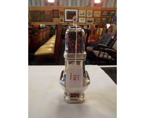 A silver George VI vase shaped octagonal sifter with acorn finial dated Sheffield 1938 and makers mark EL. weighing approx 17