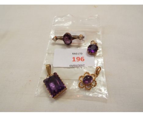 Three 9ct gold and amethyst pendants together with an amethyst and seed pearl bar brooch