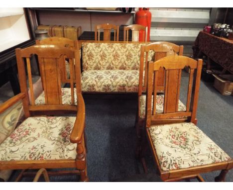 A rare British and Foreign patent oak framed settee table, the folding flap with tapestry upholstered seat and back rest, res