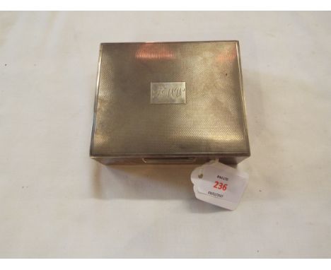 A late 20thC engine turned silver cigarette box dated Birmingham 1975 makers mark E.A.W. 