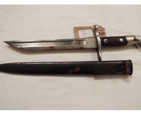 A WWI era Swiss bayonet with metal scabbard, the wooden and metal hilt with crossblade stamped '296676' and the blade marked 