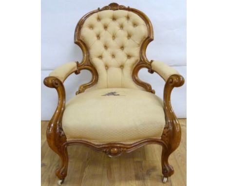 Victorian walnut framed ladies chair with scroll carved toprail, upholstered button back and seat raised on cabriole supports