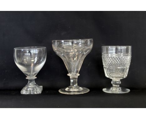 Early 19th century clear glass rummer with rounded funnel shaped bowl on short drawn concave knopped stem and moulded square 