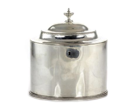 AN ANTIQUE GEORGE III STERLING SILVER TEA CADDY BY HESTER BATEMAN, LONDON 1783 the oval body with beaded borders and domed hi