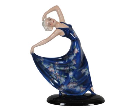 A 1930S ART DECO GOLDSCHEIDER FIGURE DESIGNED BY JOSEF LORENZL. figure of a lady in a floral painted and blue evening dress i