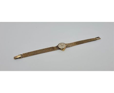 A Mappin & Webb 9ct, gold ladies' bracelet watch, manual movement, having signed silvered circular dial, 17mm wide case by D 