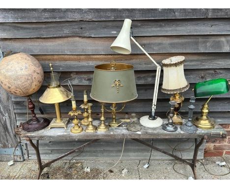 A collection of lamps together with a globe.&nbsp;