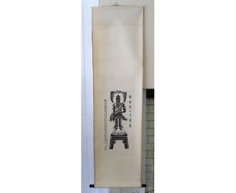 A Chinese scroll painting of a buddha