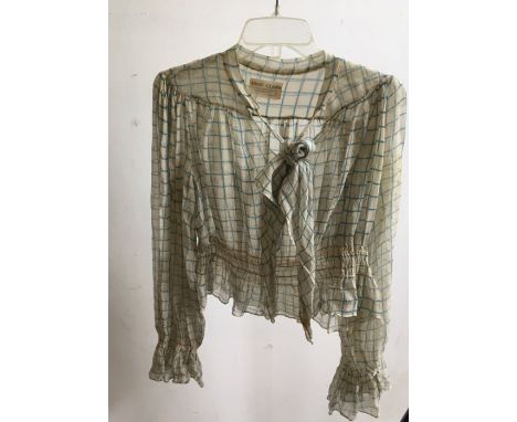 An Ossie Clark blouse Condition note: Size extra small 6-8 estimated, staining to end of bow and alsewhere, elasticated cuffs